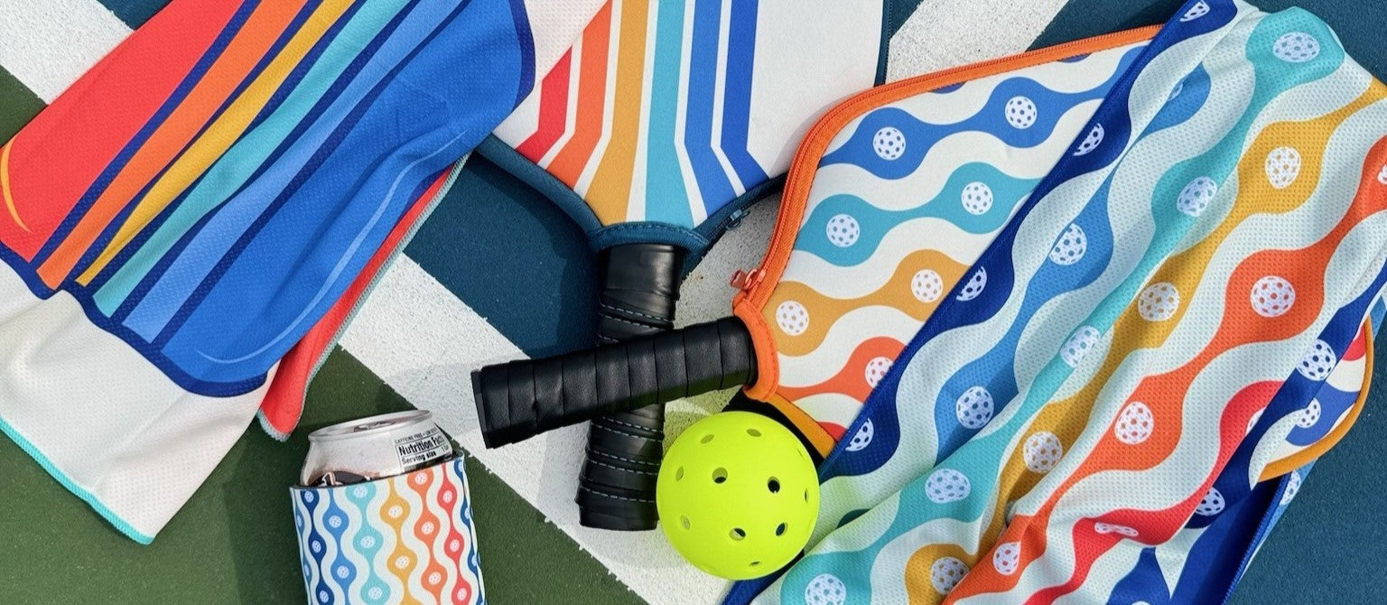 Cooling towels and paddle covers on a court