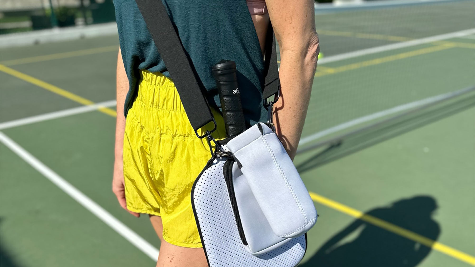 Pickleball paddle cover gift set in White on Pickleball Court